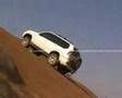 Offroad Prado on steep rock